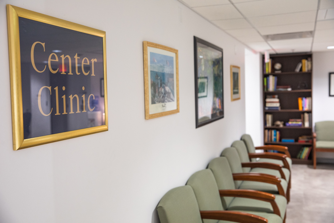 waiting room with sign reading "Center Clinic"