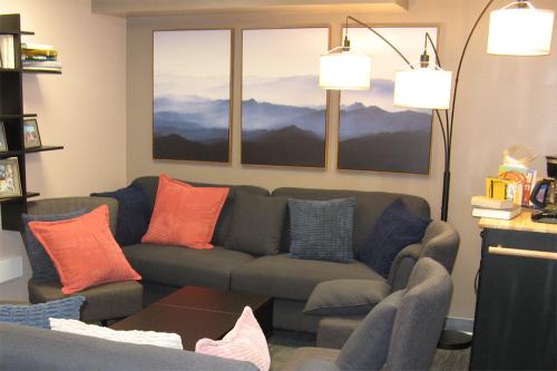 New student lounge with comfortable seating and beverage station.